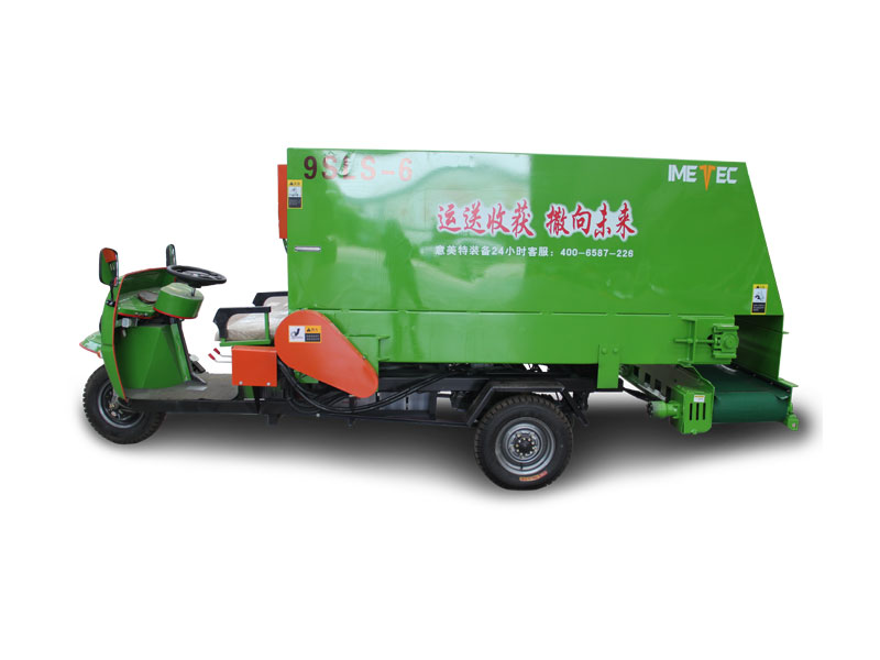 esparcidor eléctrico de tres ruedas